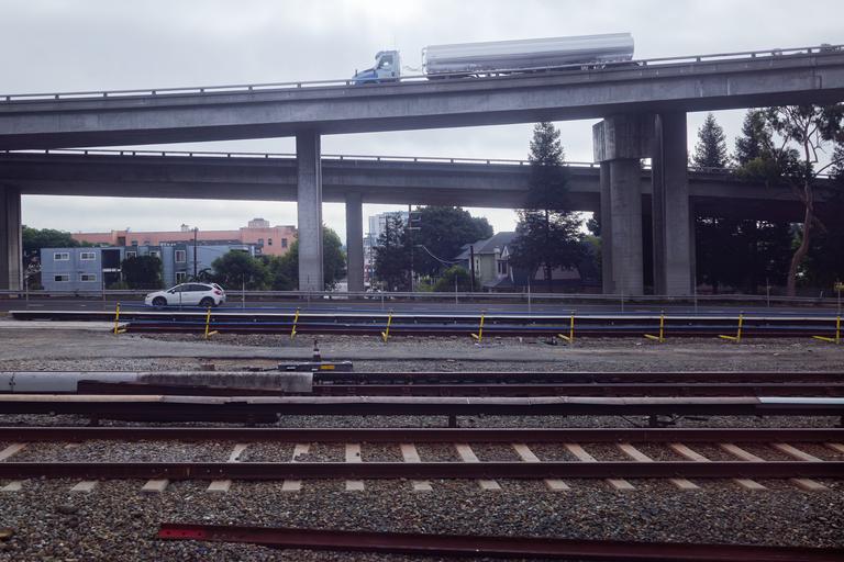 Photograph of freeway and traintracks